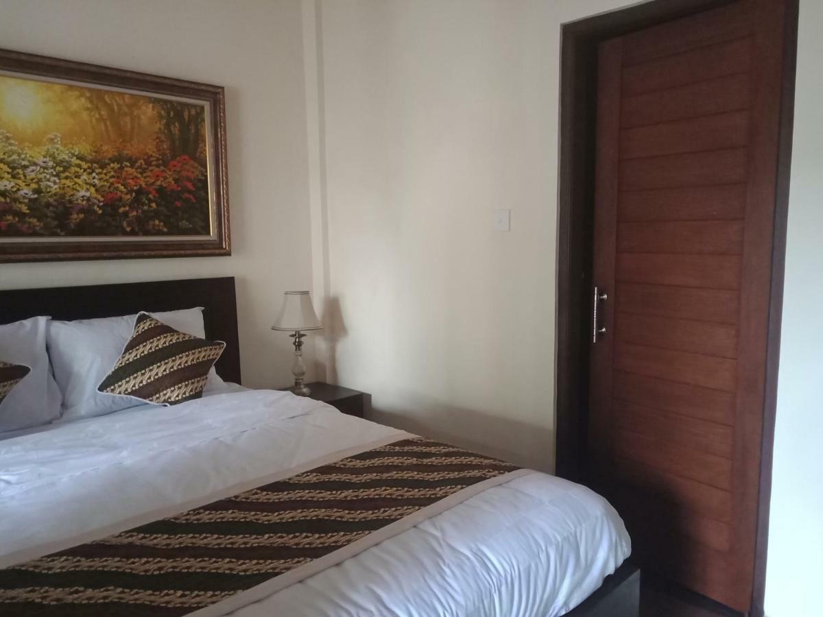 Ubud Taksu Homestay Экстерьер фото